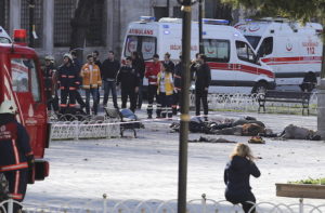 ATTENTION EDITORS - VISUALS COVERAGE OF SCENES OF DEATH OR INJURY Rescue teams gather at the scene after an explosion in central Istanbul, Turkey January 12, 2016. Turkish police sealed off a central Istanbul square in the historic Sultanahmet district on Tuesday after a large explosion, a Reuters witness said, and the Dogan news agency reported several people were injured in the blast. REUTERS/Kemal Aslan TPX IMAGES OF THE DAY TEMPLATE OUT. - RTX21Z5B