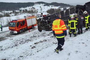 epa05152515 An image showing French rescue personnel at the site of an accident, after two children died in a French school bus crash early 10 February 2016 in Montflovin in the Doubs département of north-eastern France. The crash occurred at 7.40am amid wintery conditions. EPA/WILLY GRAFF FRANCE OUT, SWITZERLAND OUT, CORBIS OUT